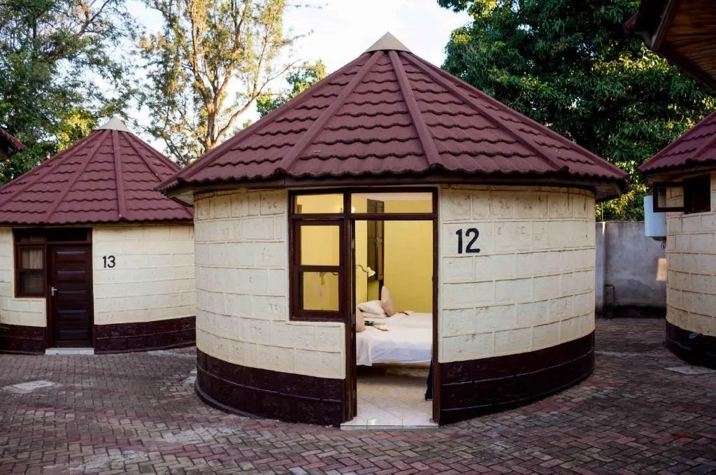 Round guest cottages with tiled roofs